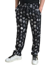 Load image into Gallery viewer, Dolce & Gabbana Elegant Silk Joggers with Religious Print