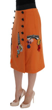 Load image into Gallery viewer, Dolce &amp; Gabbana Embellished Wool Skirt in Vivid Orange
