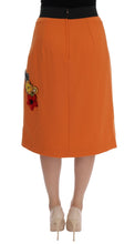 Load image into Gallery viewer, Dolce &amp; Gabbana Embellished Wool Skirt in Vivid Orange
