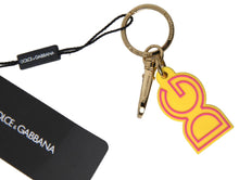 Load image into Gallery viewer, Dolce &amp; Gabbana Chic Yellow Logo-Engraved Keychain
