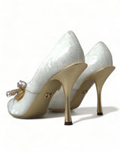 Load image into Gallery viewer, Dolce &amp; Gabbana Elegant White Patent Crystal Bow Heels
