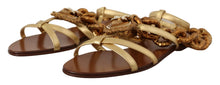 Load image into Gallery viewer, Dolce &amp; Gabbana Chic Gladiator Flats with Heart and Chain Accents
