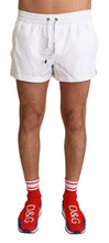 Load image into Gallery viewer, Dolce &amp; Gabbana Elegant White KING Motive Swim Trunks
