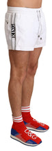 Load image into Gallery viewer, Dolce &amp; Gabbana Elegant White KING Motive Swim Trunks
