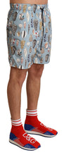 Load image into Gallery viewer, Dolce &amp; Gabbana Elegant Seashell Print Swim Trunks
