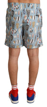 Load image into Gallery viewer, Dolce &amp; Gabbana Elegant Seashell Print Swim Trunks
