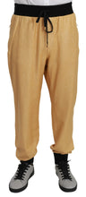 Load image into Gallery viewer, Dolce &amp; Gabbana Elegant Gold Motif Sweatpants
