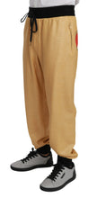 Load image into Gallery viewer, Dolce &amp; Gabbana Elegant Gold Motif Sweatpants
