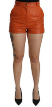 Load image into Gallery viewer, Dolce &amp; Gabbana Orange Leather High Waist Hot Pants Shorts
