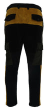 Load image into Gallery viewer, Dolce &amp; Gabbana Elegant Black Tapered Trousers with Yellow Accent
