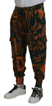Load image into Gallery viewer, Dolce &amp; Gabbana Multicolor Logo Print Silk Cargo Jogger Pants
