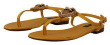 Load image into Gallery viewer, Dolce &amp; Gabbana Mustard T-Strap Flat Sandals with Heart Embellishment
